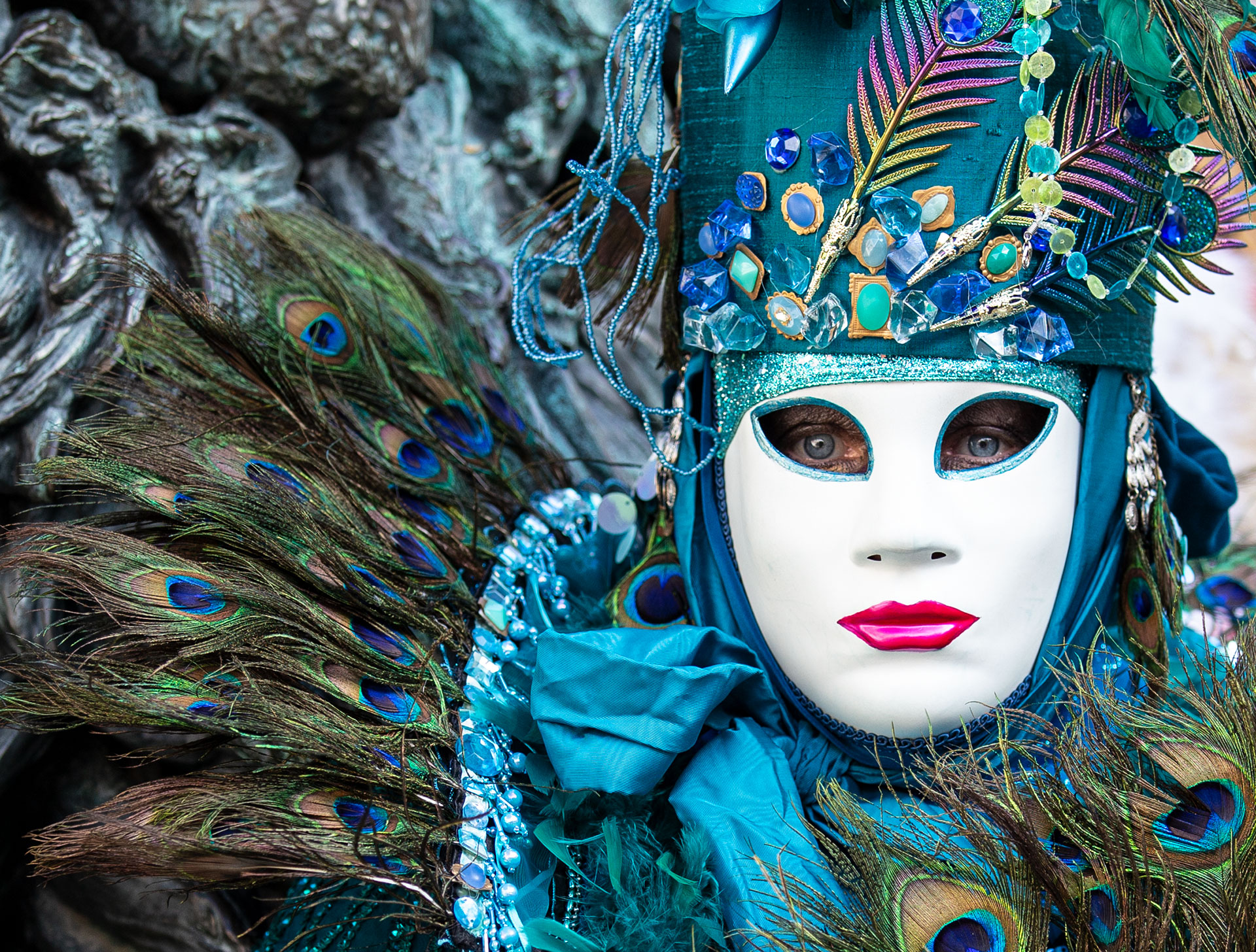 A reveller wearing a mask and a period costume takes part in the Venice Carnival on February 15, 2020- Laura Venezia