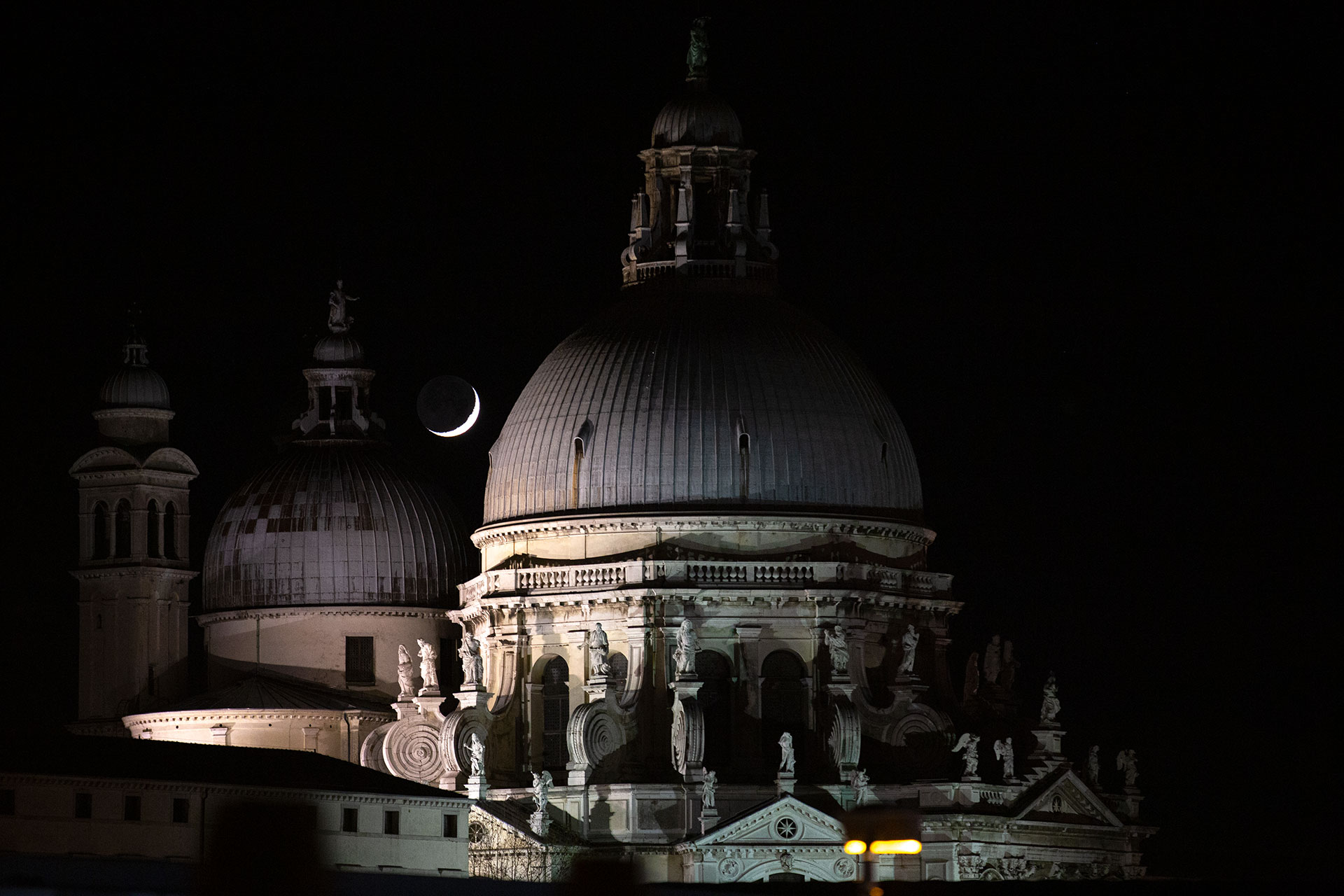 Moon over Santa Maria della Salute Church from the St.Mark's Square. Venice, February 2020-Laura Venezia