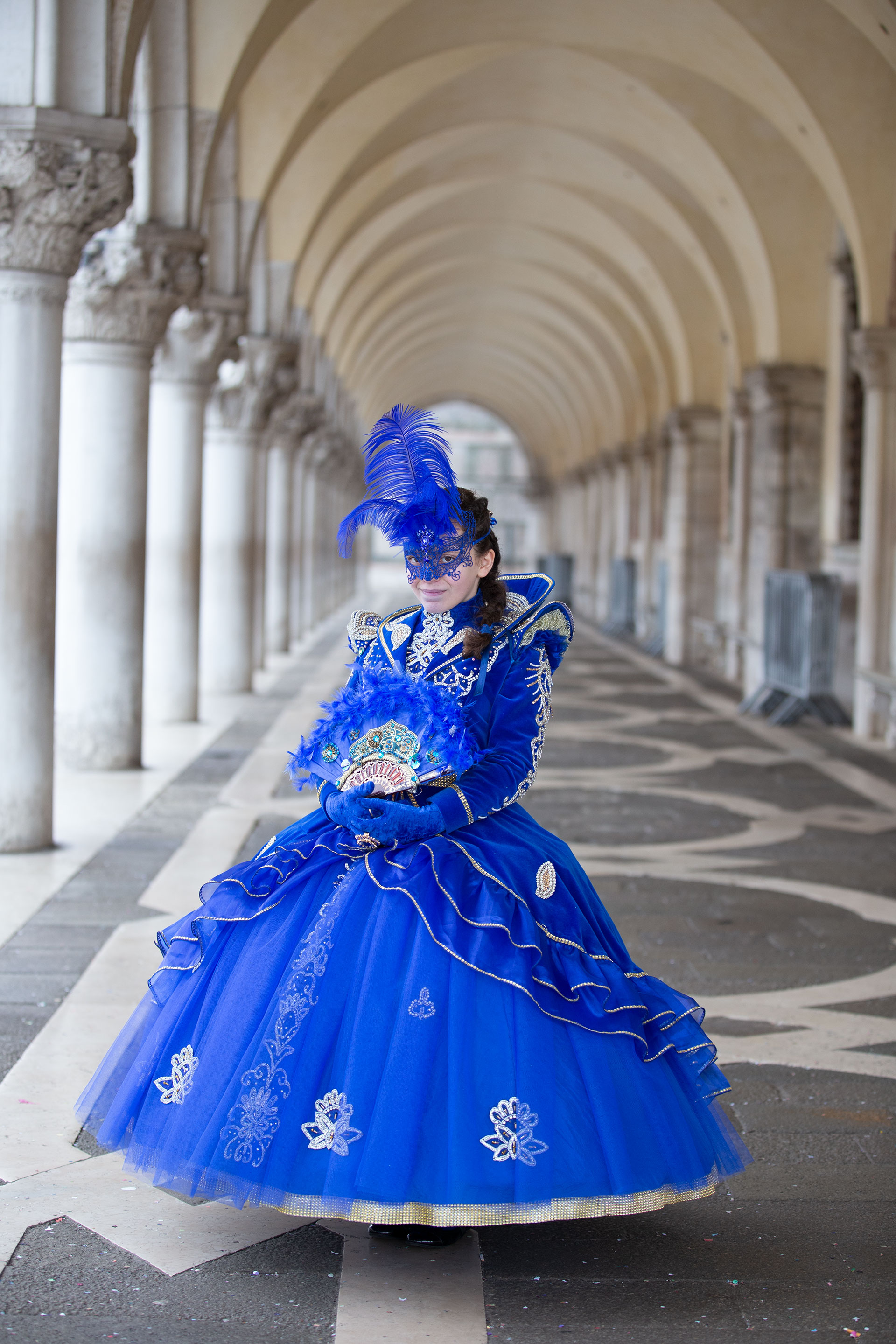 A young tourist wearing a Carnival mask visits the streets of Venice, on February 24, 2020 during the usual period of the Carnival festivities which the last two days have been cancelled due to an outbreak of the COVID-19 the novel coronavirus, in northern Italy. Venice, 24 February 2020-Laura Venezia 