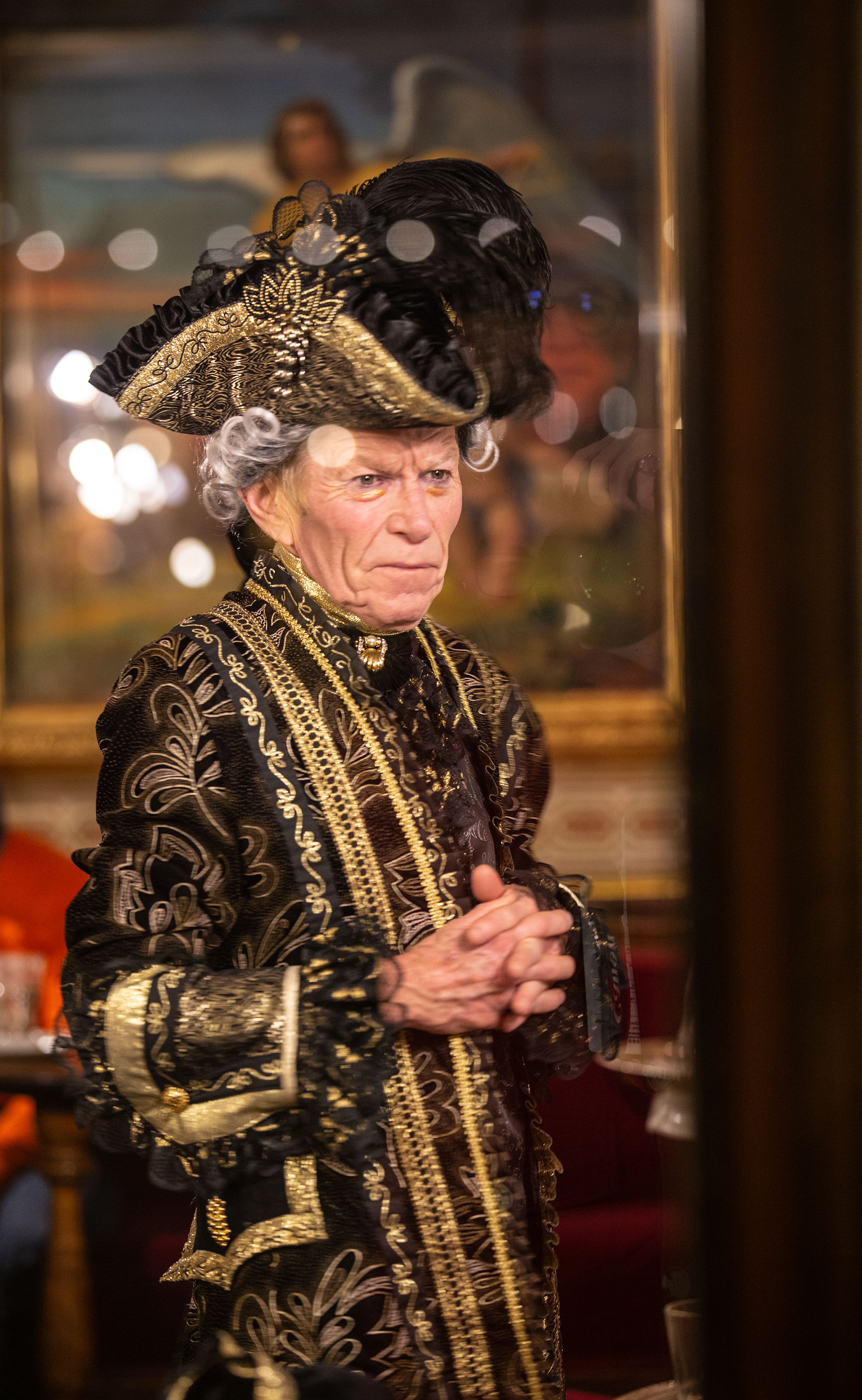 A man wearing a period costume poses by Caffe Florian on St. Mark's square during the Venice Carnival on February 15, 2020. Laura Venezia