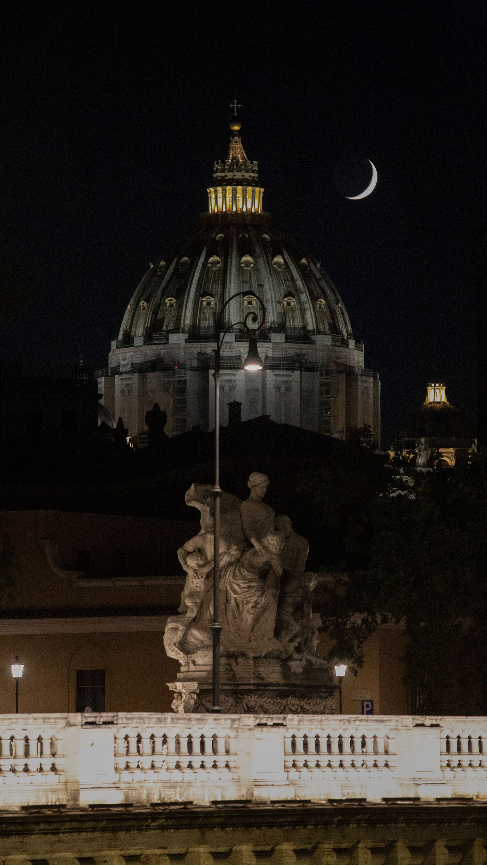 The moon above the St.Peter's Basilica of Rome. July 23, 2020-Laura Venezia